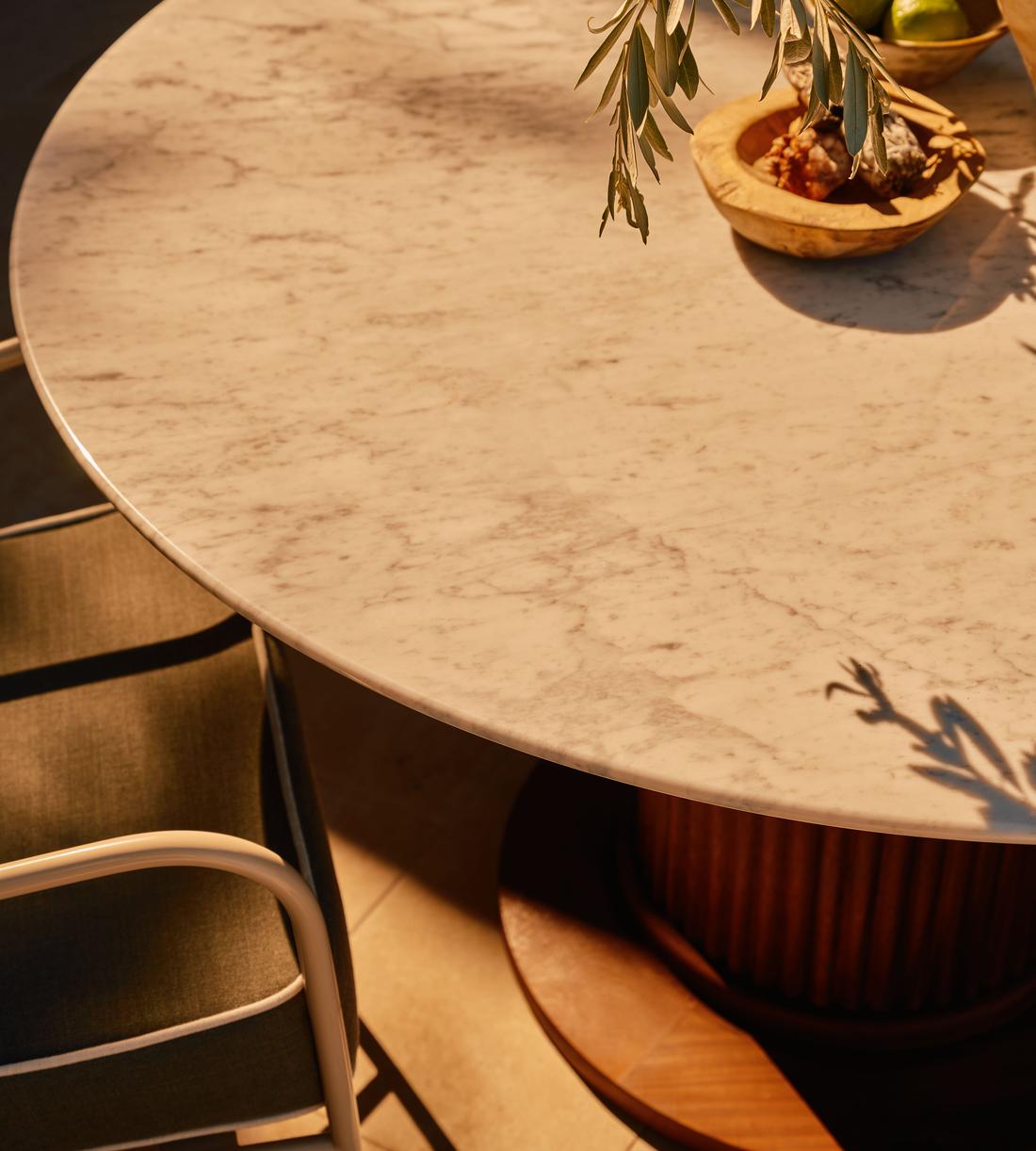 Murcell Outdoor Round Dining Table - Carrara - Lifestyle - Image 2